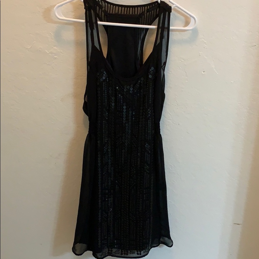 Black racerback dress with sequined front.